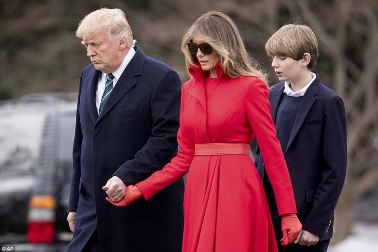 Slaying with her style: Melania managed to steal the show however, outfitted in a stunning red coat dress which she wore with matching red leather belt and gloves