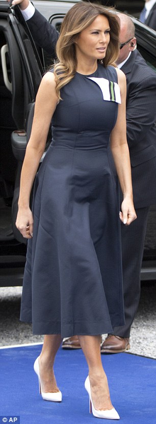 Outfit: On Wednesday, Melania wore a sleeveless navy dress by Calvin Klein in Waterloo, Belgium